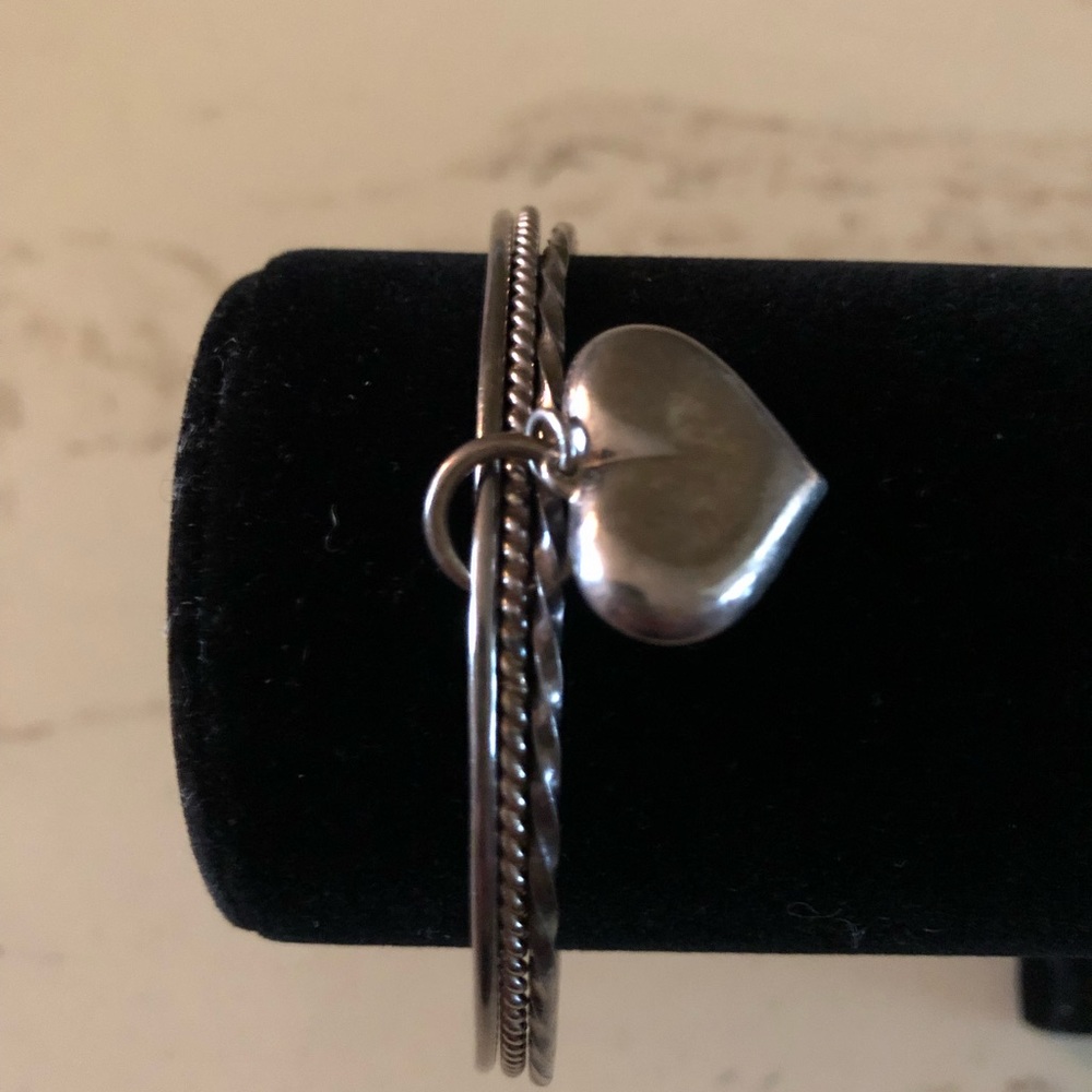 - Sterling Silver Bangles.  Set of 3 with heart charm